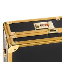 Černozlatý kadeřnický kufr